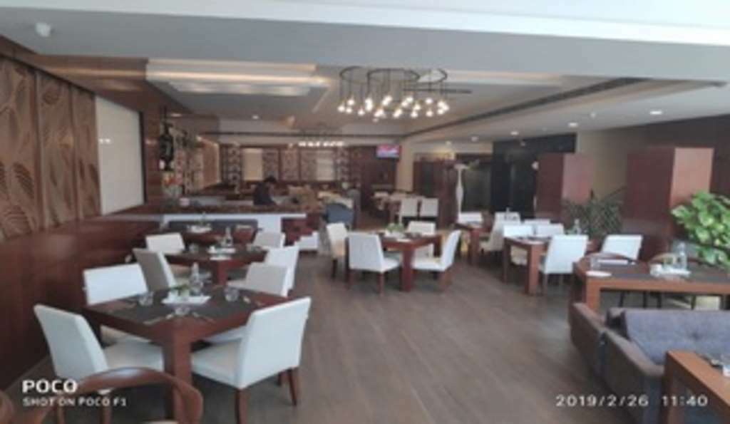 Nemesia City Center - Gurugram, Sector 29 Hotel Gurgaon Restaurant photo